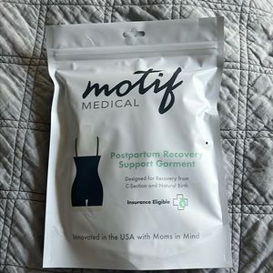 Postpartum recovery support garment